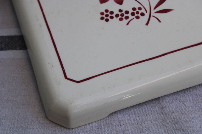 Ancien dessous de plat en porcelaine