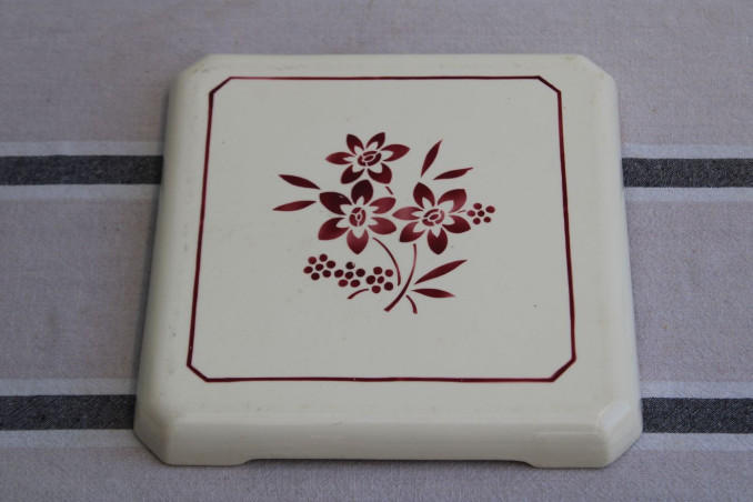 Ancien dessous de plat en porcelaine