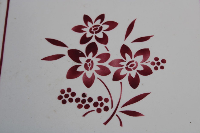 Ancien dessous de plat en porcelaine