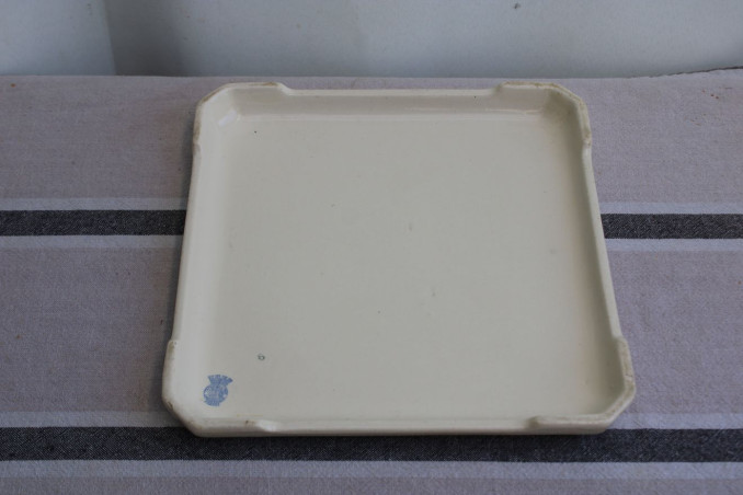 Ancien dessous de plat en porcelaine