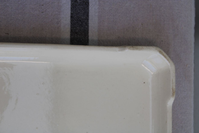 Ancien dessous de plat en porcelaine