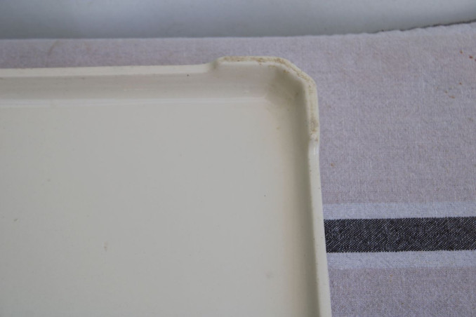 Ancien dessous de plat en porcelaine