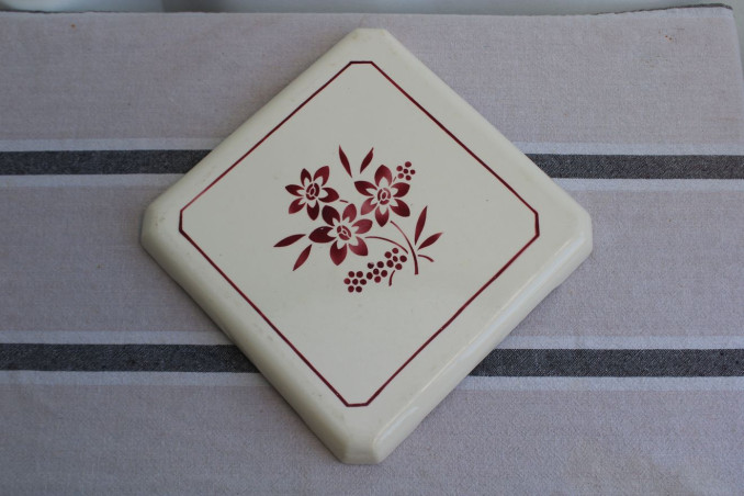 Ancien dessous de plat en porcelaine