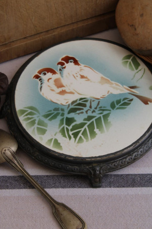 Ancien dessous de plat en céramique