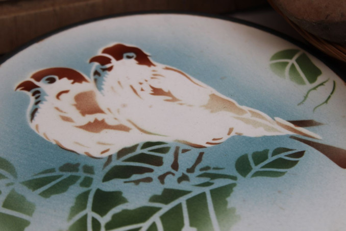 Ancien dessous de plat en céramique